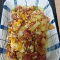 El cooksnap de Ana Isabel G C cuando hizo Patatas con beicon, jamón york, salchichas y huevos rotos con queso y gratinado.