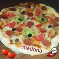 صورة من طبخات بنت الشام منى Madona ، شاركها بعد تجربة وصفة بيتزا لذيذه وسهله.