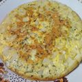 El cooksnap de Nati 💛🖤 cuando hizo Tortilla de papas, queso y aceitunas en Essen.