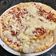 El cooksnap de OLGA cuando hizo Pizza de bacón y cebolla caramelizada.