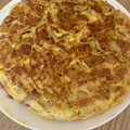 El cooksnap de Eduardo Agudo Alba cuando hizo Tortilla de patatas con bacon, sobre lonchas de jamón serrano.