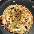 Bansi patel's cooksnap of when they made ઉત્તપમ પીઝા (Uttapam Pizza Recipe In Gujarati).