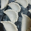 El cooksnap de Juan Pablo cuando hizo Empanadas de carne con relleno echo en el disco.