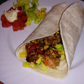 El cooksnap de Esther Ariza Sánchez cuando hizo Fajitas de pollo con pimientos y tomate frito.