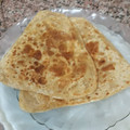 Asha Sharma's cooksnap of when they made Ajwain ka layered triangular paratha.