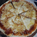 El cooksnap de Grissel Peralta cuando hizo Pizza de muzzarella y aceitunas.