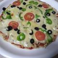 Umbreen Musa's cooksnap of when they made Chicken tikka pizza.