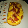 El cooksnap de julian.novellon cuando hizo Tostadas con huevos, queso y bacon (al horno) 🍞🧀🥓.