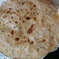 Vanika Agrawal's cooksnap of when they made Ajwain ka layered triangular paratha.