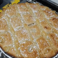 El cooksnap de yami cuando hizo Torta matera con crema pastelera (toque de naranja).