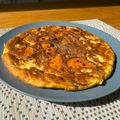 Liam's cooksnap of when they made Spanish inspired omelette with potato, onion and pumpkin in air-fryer!.