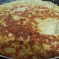 El cooksnap de Jorgelina Coceres cuando hizo Tortilla de papas ralladas y cebollas.