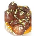 Urooj Fatima Siddiqui's cooksnap of when they made Gulab Jamun with Milk Powder.