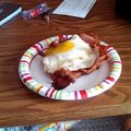 jeff.harsch's cooksnap of when they made scrambled eggs in a bacon basket.