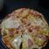 El cooksnap de Lucia Sánchez cuando hizo Pizza casera con queso papitas y huevos fritos.