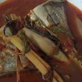 Cooksnap Rose Nani Nizah Nayan semasa beliau membuat Masak asam pedas kepala ikan jenahak.