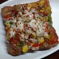 Mamta Malav का कुकस्नैप जब उन्होंने होममेड ब्रेड पिज़्ज़ा (Homemade bread pizza recipe in Hindi) बनाया था।