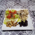 El cooksnap de Lady Marmalade cuando hizo Combinado de merluza y ensalada con frutos secos.