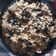 El cooksnap de carles cuando hizo Arroz con pollo y setas "trompeta negra".