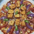 sandhya Dutta 's cooksnap of when they made পনির লেসুনি টিক্কা পিজ্জা(paneer lehsuni tikka pizza recipe in Bengali).