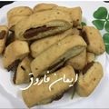 صورة من Eman Farooq، شاركها بعد تجربة وصفة اصابع التمر بالسمسم الهشة 😍 حلويات العيد😁