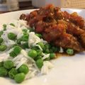 Jacob 's cooksnap of when they made spicy chicken curry, nan bread with rice & peas.