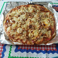 El cooksnap de Paola cuando hizo Pizza de queso de cabra, cebolla caramelizada y nueces con base casera integral.