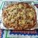 El cooksnap de Paola cuando hizo Pizza de queso de cabra, cebolla caramelizada y nueces con base casera integral.