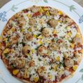 Vaishali Arora's cooksnap of when they made Chicken tikka pizza.