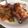 El cooksnap de claudiasoldan cuando hizo Muslos de pollo en adobo al horno con cama de batata y cebolla.