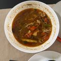 Cooksnap Zara Rania semasa beliau membuat Tomyam Ayam Enoki.