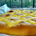 El cooksnap de Cook_and_Jud cuando hizo Coca de brioche con crema y piñones.