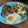 El cooksnap de Mel cuando hizo BISTEC CON HUEVO FRITO Y PAPAS HORNEADAS CON CHAQUETA. JON STYLE.