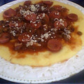 El cooksnap de juliocorti70 cuando hizo Polenta con queso cremoso y salchichas en salsa de tomate.