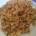 Walies Cuisine 's cooksnap of when they made Palm oil Jollof Rice.