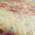 El cooksnap de Masmus Ezquerro cuando hizo Tortilla de patatas con cebolla, pimiento y jamón.