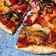 Cooksnap của Emily Luu khi họ làm theo món Pizza đế mỏng với hành tây, tỏi, và cà chua thân gỗ