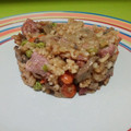 El cooksnap de Asisoyyo cuando hizo Arroz frito con salchicha fresca champiñones bacon y jamón de york.