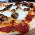 Miles's cooksnap of when they made Prosciutto and Mushroom Pizza.