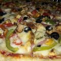 Naila Asif's cooksnap of when they made Chicken tikka pizza.