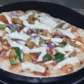 Saira Abdullah's cooksnap of when they made Chicken Tikka Pizza 🍕.