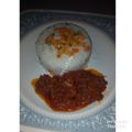Zee's Kitchen's cooksnap of when they made White rice and stew garnished with carrots and cucumber.