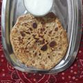 Anu kapoor 's cooksnap of when they made Aloo paratha.