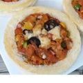 Bushra Jawad's cooksnap of when they made Bread disk pizza.
