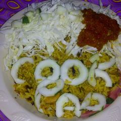 A picture of Fried rice, cabbage n tarugu sauce.