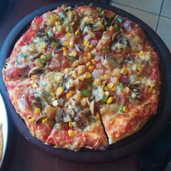 A picture of Fresh veggies and cheesy pizza#veganContest.
