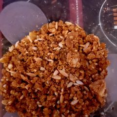 A picture of Garam sonth or warm ginger spice sweet mixture.