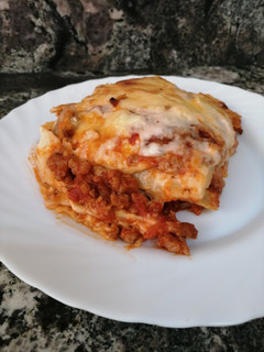 Una foto de Lasagna con queso