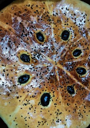 صورة لوصفة فطيرة بحجم عائلي رائعة و بنينة👍🍕