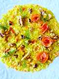RISOTTO ZAFFERANO E SALMONE, NOCI TOSTATE E TZEST DI LIMONE